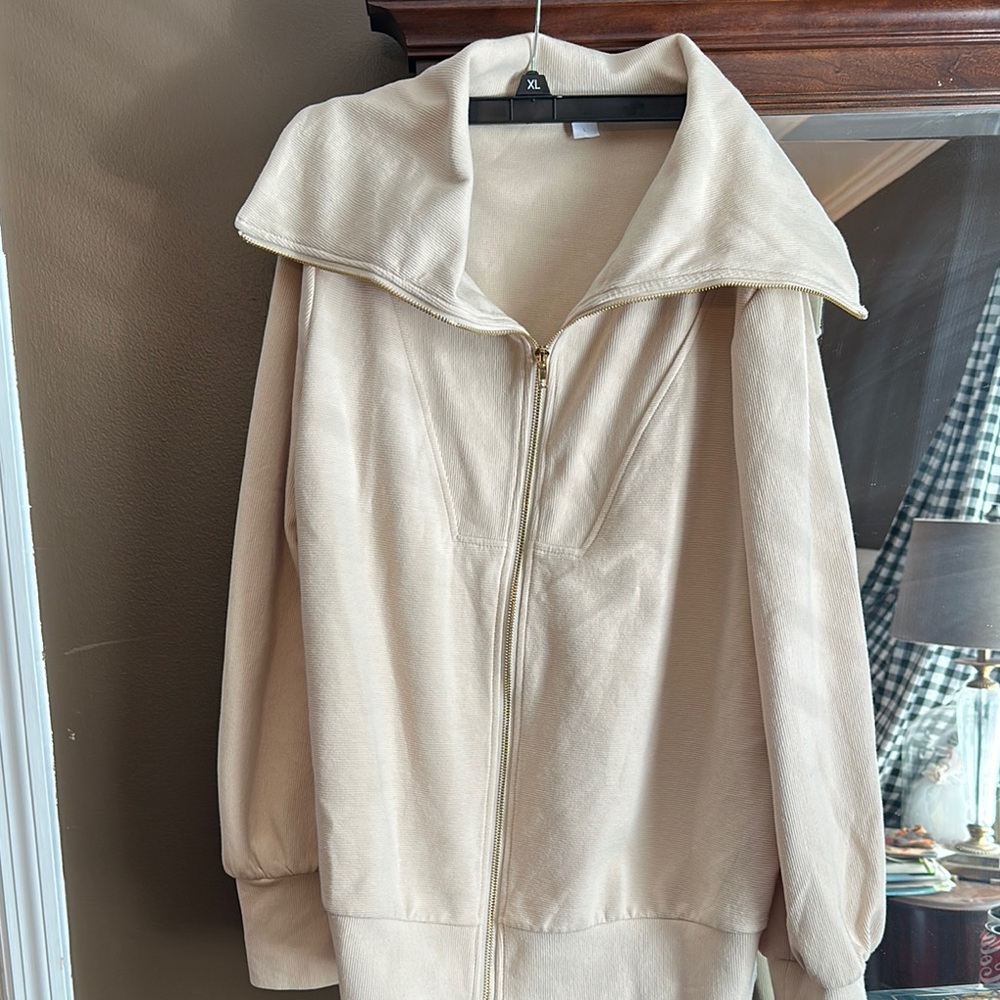 Lovely Cream colored women’s sweater